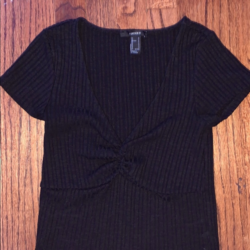 black ribbed shirt with cinch in middle